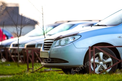Preview: Cars parked on a parking lot in city