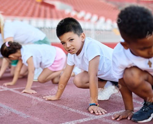 Preview: Children having sport exercise training class outdoors