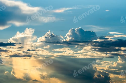 Preview: Golden Sunlight Bursting Through Soft Clouds