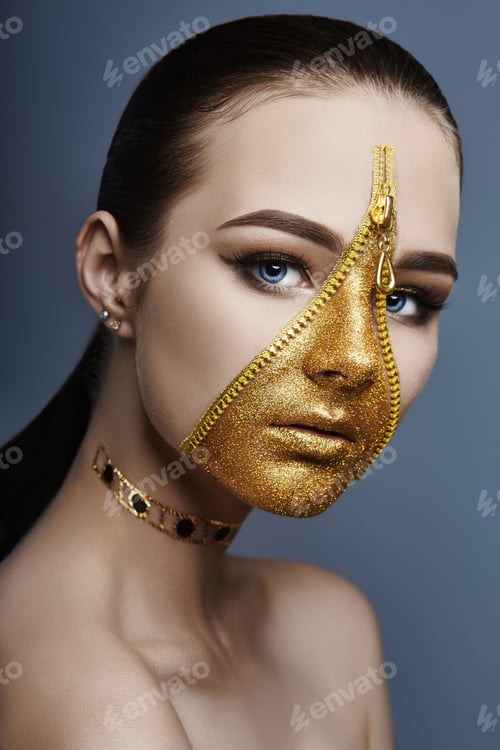 Preview: Creative grim makeup face of girl Golden color zipper clothing on skin. Fashion beauty creative