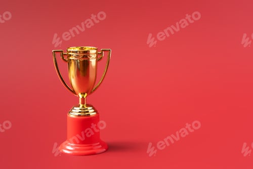 Preview: Gold color victory cup on red background