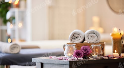 Preview: Relax, peace and calm at a luxury spa for wellness, health and zen during a massage. Candles, flowe