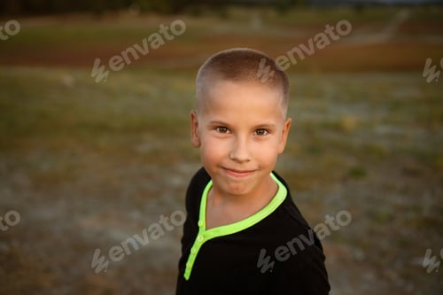 Preview: Happy little boy smiling. a guy of caucasian ethnicity