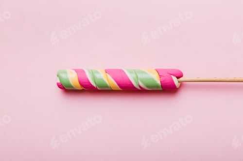 Preview: Colorful candies, lollypop on the colorful background, multicolored minimal style top view