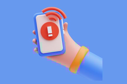 Preview: Hand holding smartphone displaying exclamation mark icon