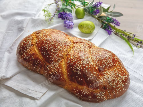 Preview: Easter sweet bread, homemade tsoureki braid and Easter decoration on the table