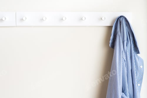 Preview: Blue Striped Shirt Hanging on a White Rack