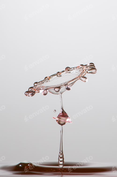 Preview: Splash of colorful liquid with high speed flash
