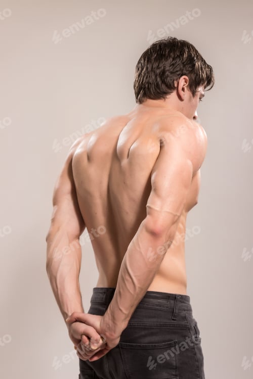 Preview: Rear View, Strong Vascular Muscular Young Adult Man, Bodybuilder, Back Muscles. White Background