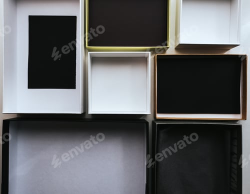 Preview: Group of empty multi-colored cardboard boxes.