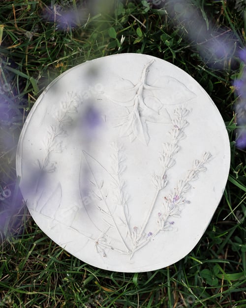 Preview: Creation of stencil ceramics with flowers, leaves of lavender and other plants by pressing on table