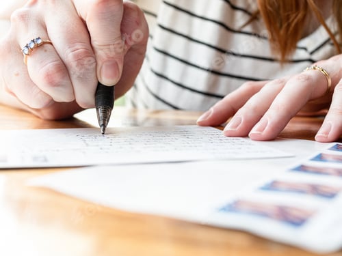 Preview: Woman Writing a Postcard