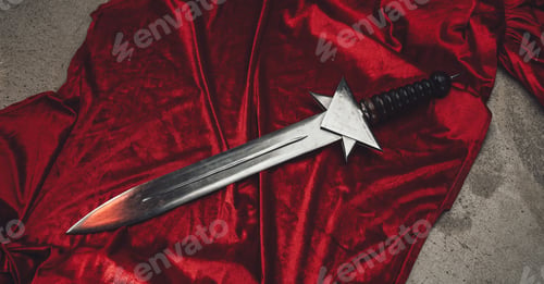 Preview: Antique roman short sword its on red cape on floor