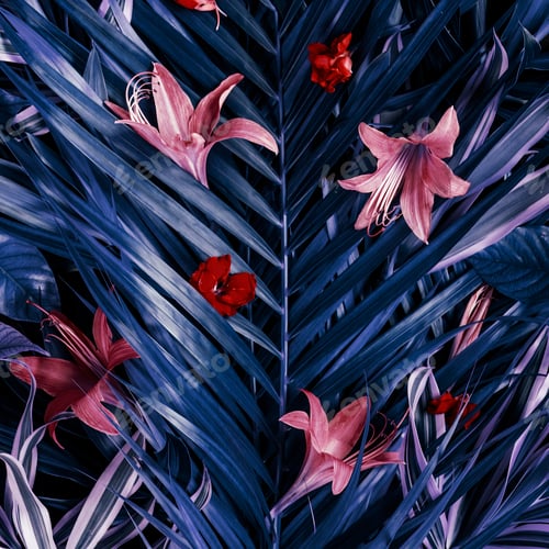 Preview: Creative fluorescent background of leaves and flowers of tropical plants.