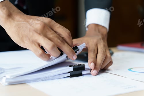 Preview: Business man working with laptop. Young business man thinking Concentrated at work.
