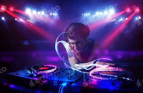 Preview: Handsome Disc Jockey Playing Music With Light Beam Effects On Stage