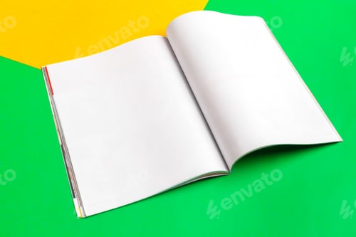 Preview: Blank pages waiting for creativity on vibrant green and yellow background