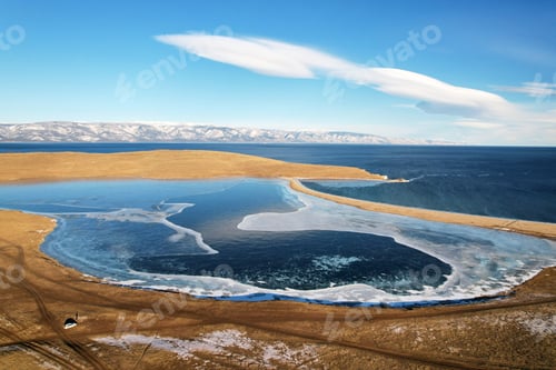 Preview: Frozen Lake Khankhoy on the island of Olkhon and unfrozen Lake Baikal