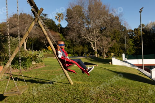 Preview: Superhero boy in garden