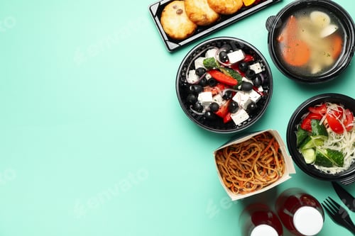 Preview: Food delivery. Food in takeaway boxes on mint background