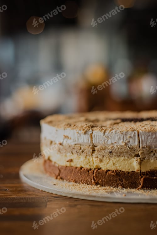 Preview: Close-up shot of a delicious cheesecake on a wooden table in a restaurant