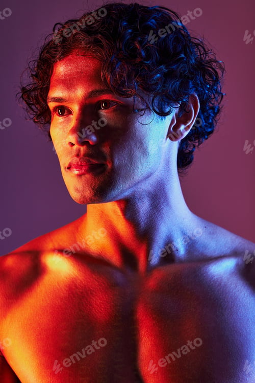 Preview: Light, beauty and man in a studio with art lighting and thinking with self care and neon. Focus, is