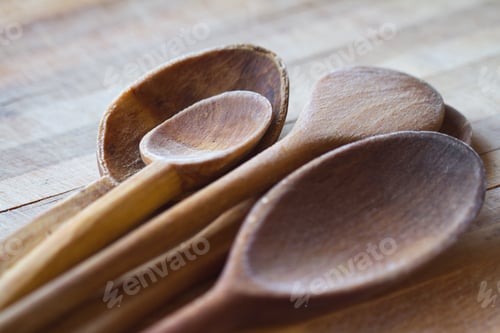 Preview: kitchen wooden spoons on wooden board