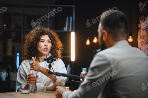 Preview: Two content creators recording podcast in modern studio