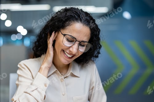Preview: A woman at the workplace inside the office has a severe pain in her ear, the office worker is sick