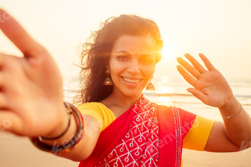 Preview: self portrait of gorgeous beautiful indian woman taking selfie photo