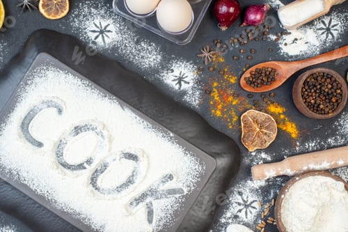 Preview: top view flour cook writing eggs vegetables raw pasta and seasonings on dark background vegetable