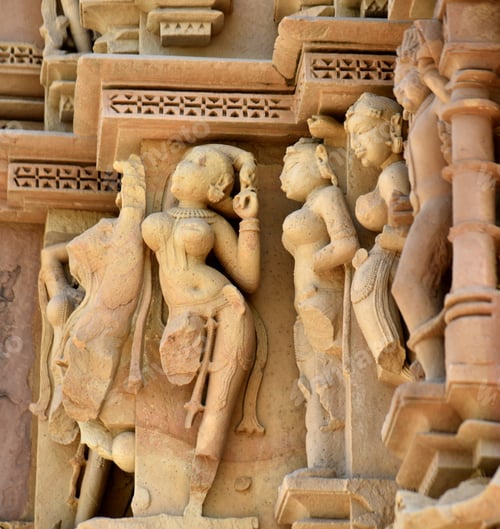Preview: Sculpture of erotic woman on Khajuraho Temple.