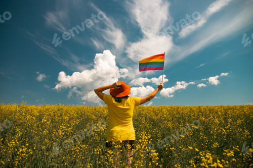 Preview: Young woman with LGBT flag.