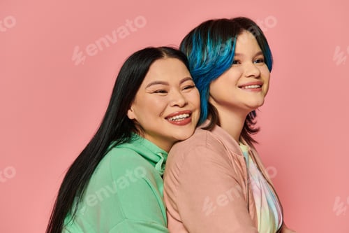 Preview: Harmonious embrace: two women with blue hair