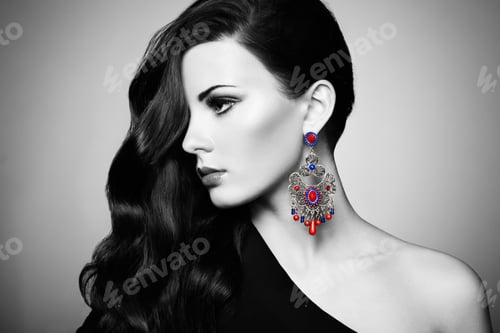 Preview: Portrait of beautiful brunette woman in black dress