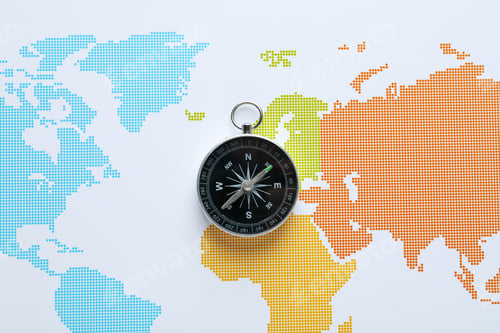 Preview: Traveling, adventure and vacation concept with compass