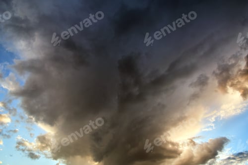 Preview: Landscape of dark clouds forming on stormy sky during thunderstorm.