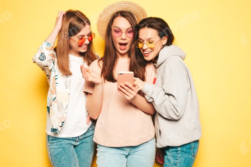 Preview: Three young beautiful women posing in studio