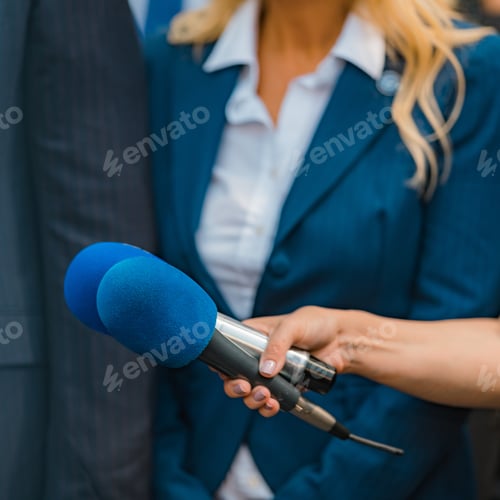 Preview: Media interview, a politician at media press conference.