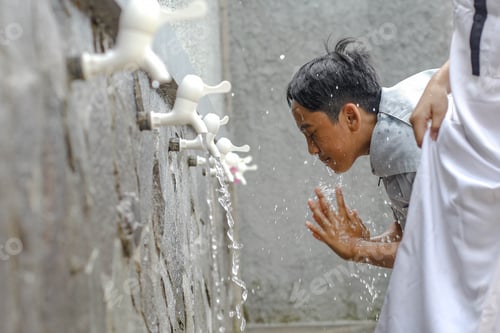 Preview: Boy taking ablution