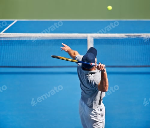 Preview: Showing up to every tennis practice. Shot of a man trying to return a ball on a tennis court.