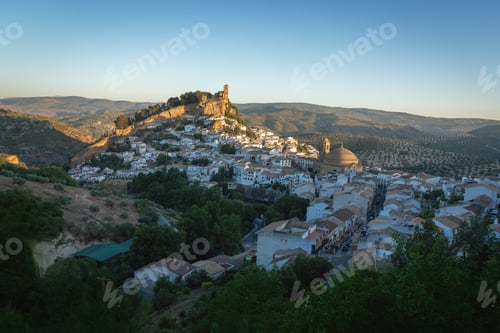 Preview: Skyline with Iglesia de la Villa Church and La Encarnacion Church at sunrise - Montefrio, Spain