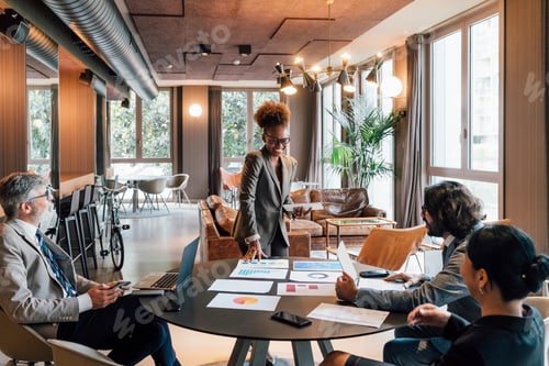 Preview: Italy, Business people having meeting in creative studio