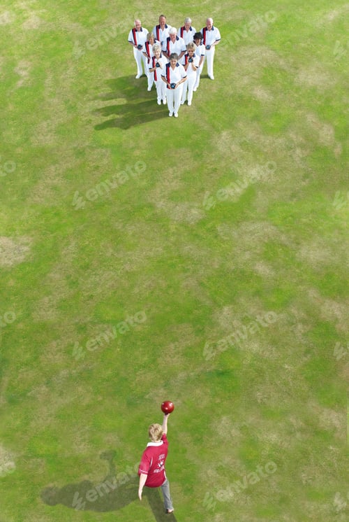 Preview: bowler bowling at group of people