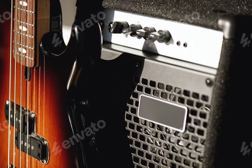 Preview: Beautiful and perfect polished electric guitar with amplifier standing in audio recording studio