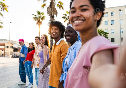 Preview: Multiethnic group of young happy friends hanging out