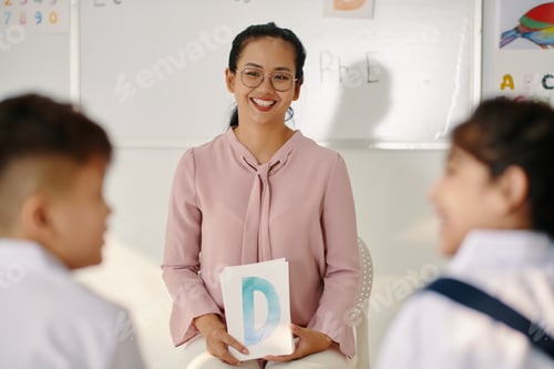 Preview: Proud Teacher Looking at Her Students