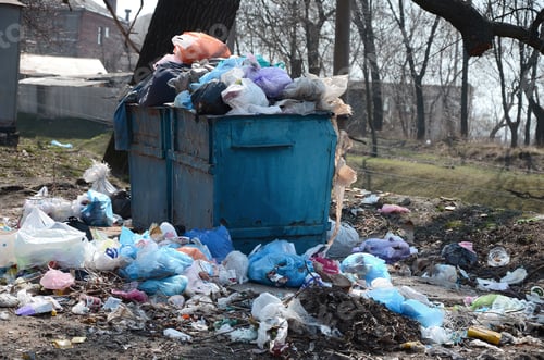 Preview: Garbage can is packed with garbage and waste. Untimely removal of garbage in populated areas