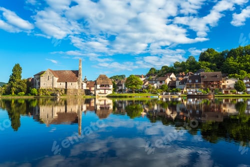 Preview: Chapel of the Penitents and houses in the town of Beaulieu sur Dordogne, Correze, Limousin, France