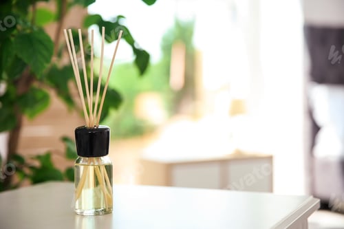 Preview: Aromatic reed air freshener on table indoors